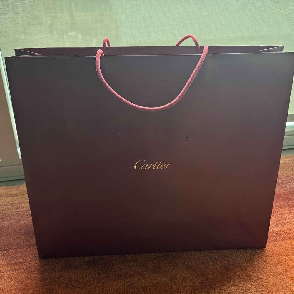 Authentic Cartier Deep Red Bag
17” tall 21” wide, thick is 5.5
Extra large!